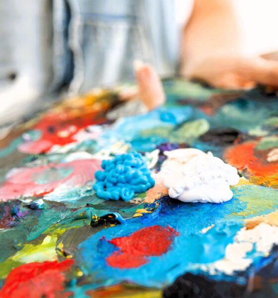 close up person holding painting palette 2638 x 1759