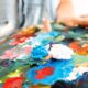 close up person holding painting palette 2638 x 1759